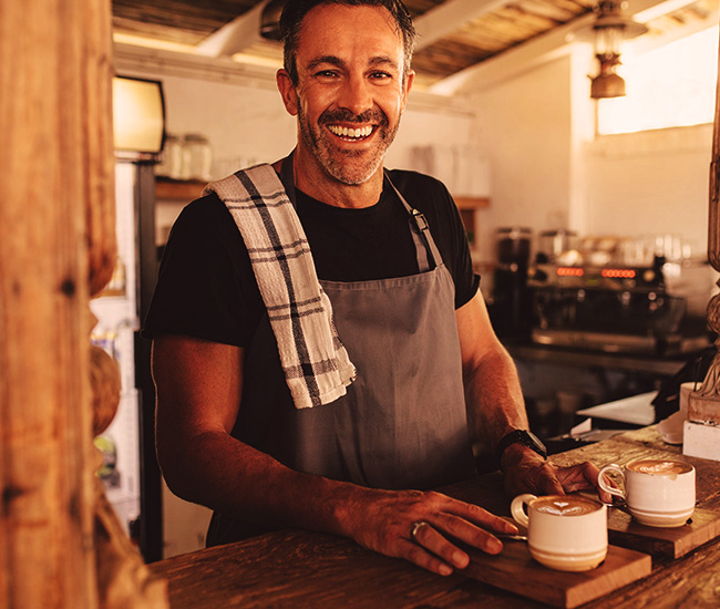 Barista serving coffee