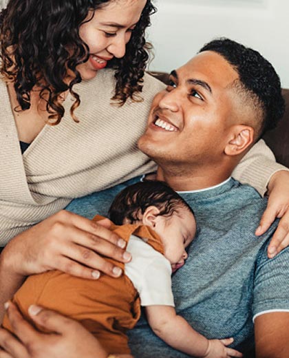 A young family with a newborn baby